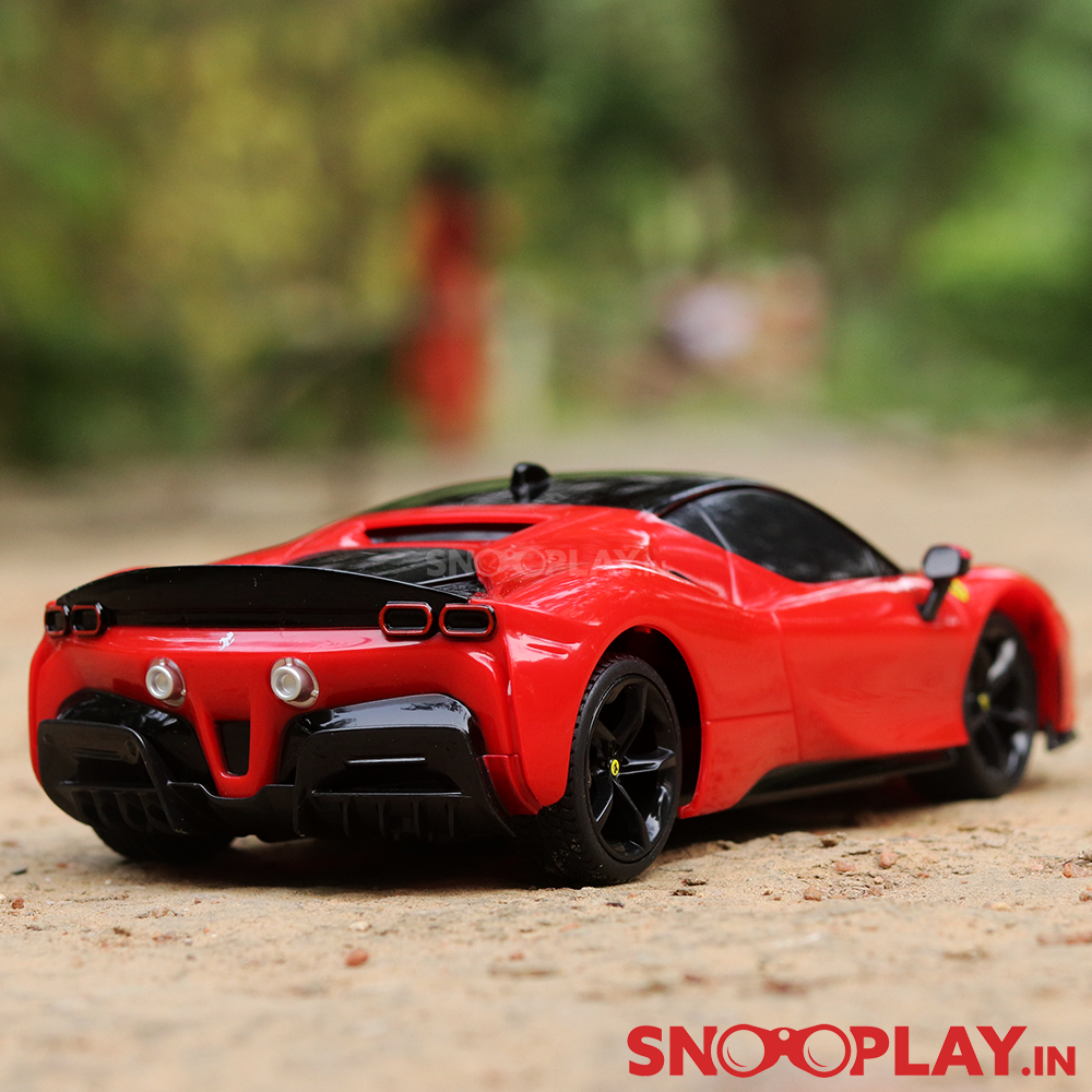 The back side of the Ferrari SF90 Stradale remote control car with a prancing horse logo.