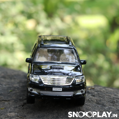 The most powerful black beast, Fortuner Miniature toy car, with a pull back feature.