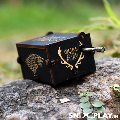 The lightweight, portable and beautifully carved GOT hand engraved wooden music box that says the very famous dialogue "Ours is the Fury'. 
