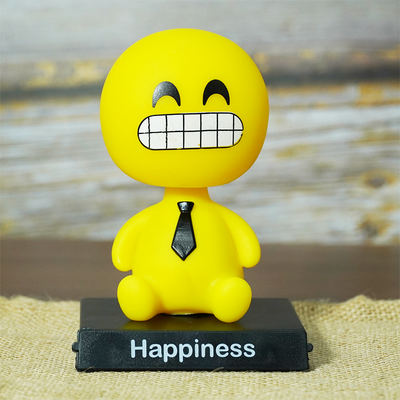 Grinning face emoji bobblehead with phone stand front image.