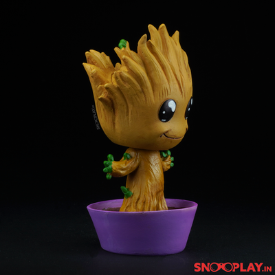 The Baby Groot bobblehead in a mud pot of height approx 4.8 inches with base.