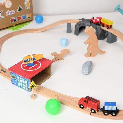 The Dino Land-Second Set-1 Plastic Bridge,2 Plastic Attachment,2 Dinosaurs,2 Stones,1 Helicopter,1 Helicopter Pad,1 Fire Extinguisher,2 Signals,15 Tracks.