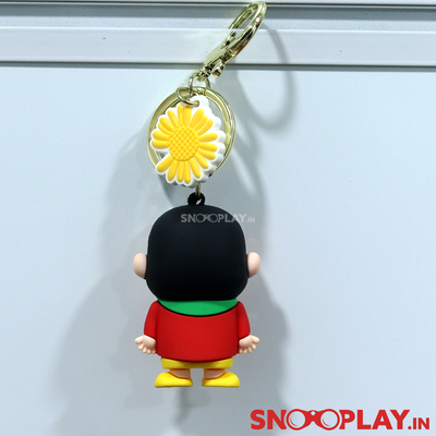 Back side of the Shin Chan figure keychain, of height 2.4 inches, dressed in red attire.