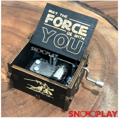 Ideal for decor and gifting purposes, the Star Wars theme hand engraved wooden musical box.