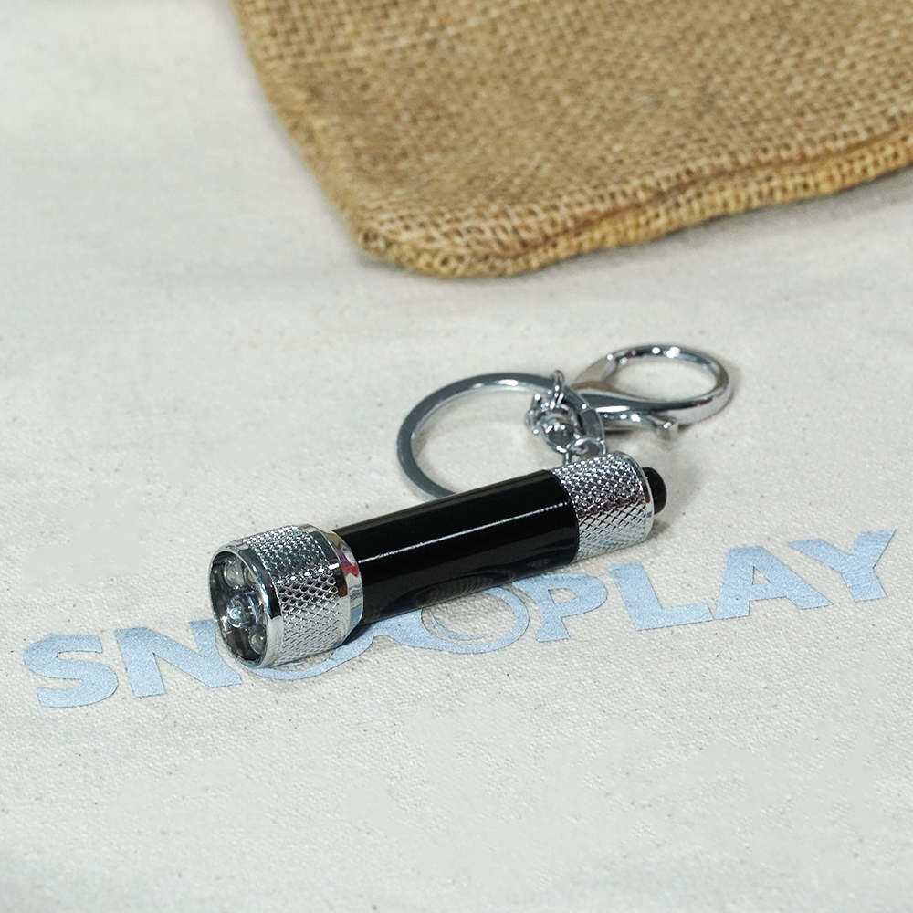 The black coloured Torch keychain (flashlight) with lobster clasp hook, perfect for a unique gift present.