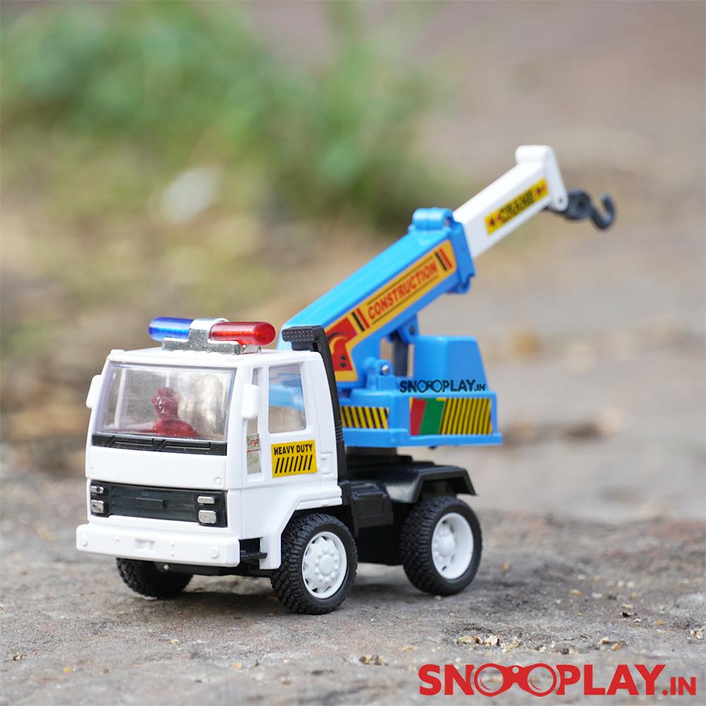 The construction toy truck, miniature scale model for toddlers to understand different kinds of occupations that exist.