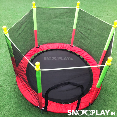 The top view of the trampoline for kids that comes with a safety net and can be setup in your backyard or garden.