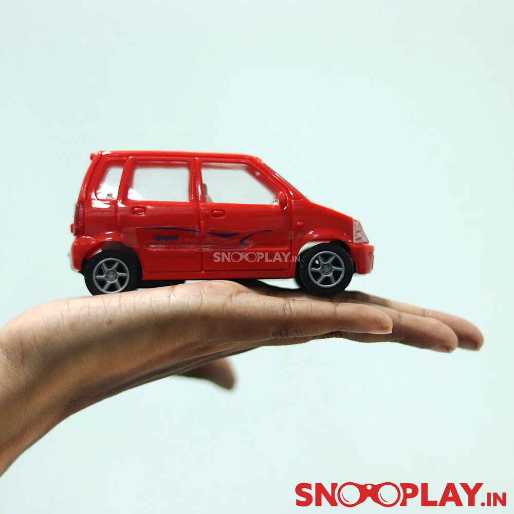 Red coloured Wagon R toy car of length 4.4 inches.