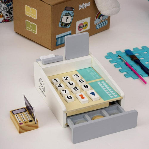 Playbox 15 Pieces Funny Money Cashier Wooden Playset - 1 Cashier, 8 Coins, 5 Currency Notes, 1 Credit Card, 1 Card Machine, 1 Display (3-8 Years)